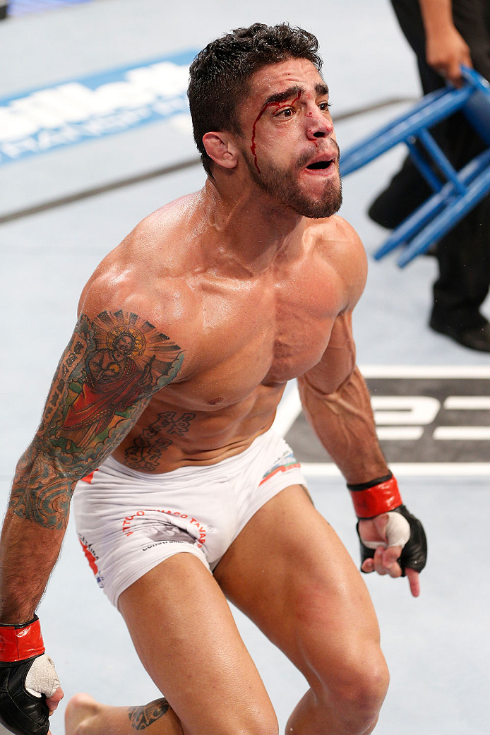 GOIANIA, BRAZIL - NOVEMBER 09: Thiago Tavares reacts after his submission victory over Justin Salas in their lightweight bout during the UFC event at Arena Goiania on November 9, 2013 in Goiania, Brazil. (Photo by Josh Hedges/Zuffa LLC/Zuffa LLC via Getty