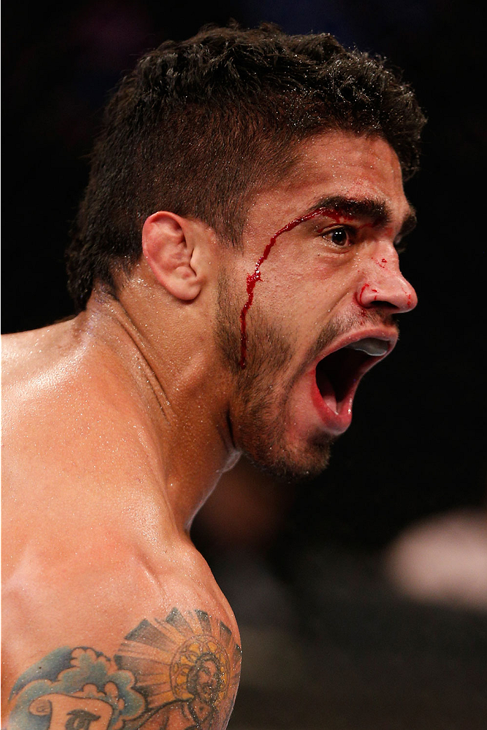 GOIANIA, BRAZIL - NOVEMBER 09: Thiago Tavares reacts after his submission victory over Justin Salas in their lightweight bout during the UFC event at Arena Goiania on November 9, 2013 in Goiania, Brazil. (Photo by Josh Hedges/Zuffa LLC/Zuffa LLC via Getty