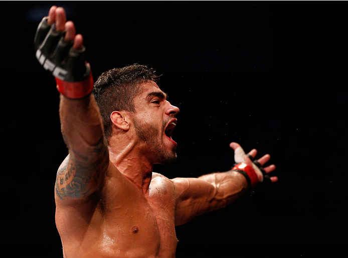 GOIANIA, BRAZIL - NOVEMBER 09: Thiago Tavares reacts after his submission victory over Justin Salas in their lightweight bout during the UFC event at Arena Goiania on November 9, 2013 in Goiania, Brazil. (Photo by Josh Hedges/Zuffa LLC/Zuffa LLC via Getty