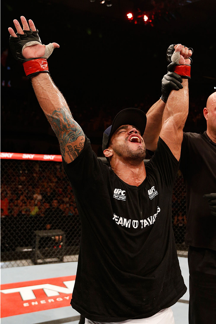 GOIANIA, BRAZIL - NOVEMBER 09: Thiago Tavares reacts after his submission victory over Justin Salas in their lightweight bout during the UFC event at Arena Goiania on November 9, 2013 in Goiania, Brazil. (Photo by Josh Hedges/Zuffa LLC/Zuffa LLC via Getty