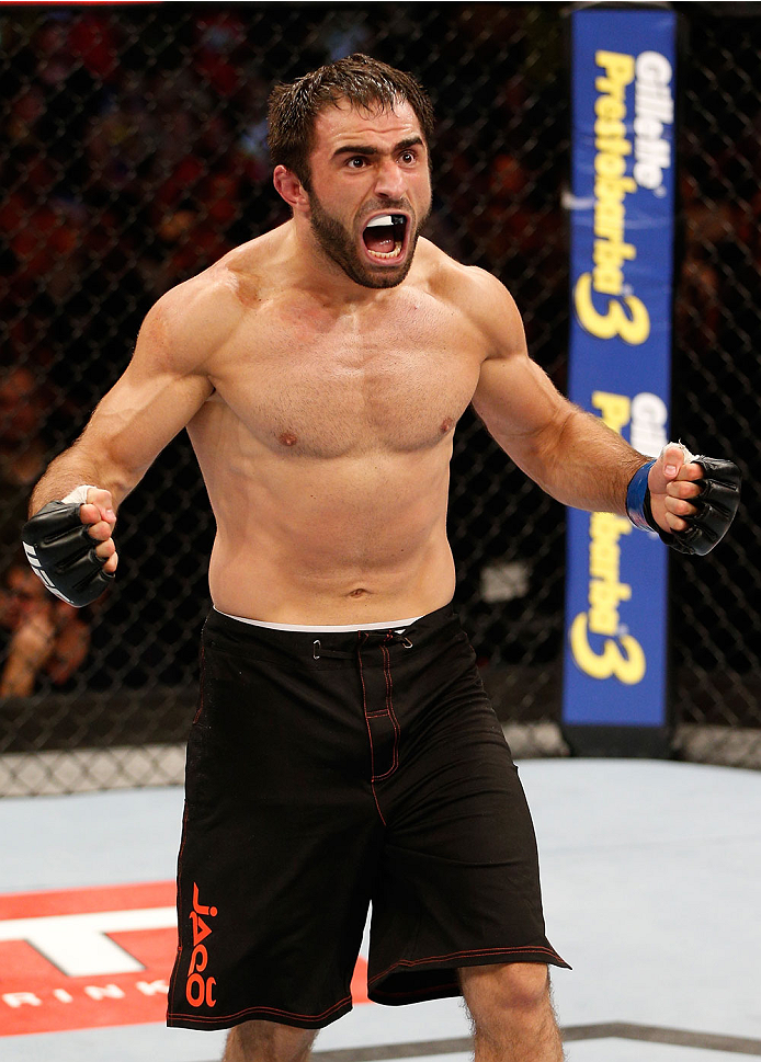 GOIANIA, BRAZIL - NOVEMBER 09: Omari Akhmedov reacts after his knockout victory over Thiago Perpetuo in their middleweight bout during the UFC event at Arena Goiania on November 9, 2013 in Goiania, Brazil. (Photo by Josh Hedges/Zuffa LLC/Zuffa LLC via Get