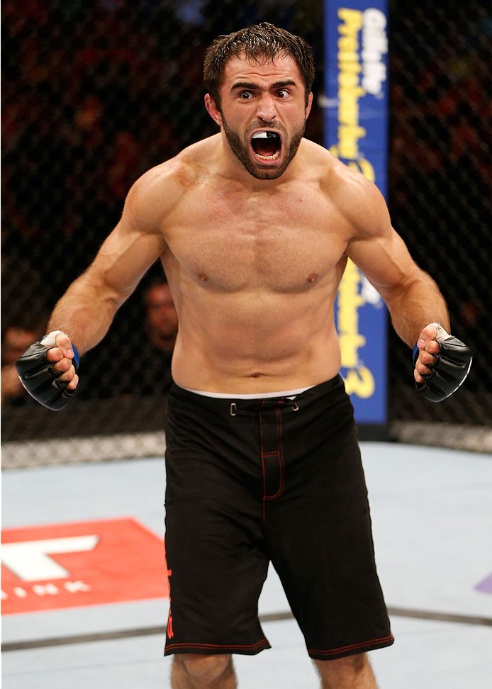 GOIANIA, BRAZIL - NOVEMBER 09: Omari Akhmedov reacts after his knockout victory over Thiago Perpetuo in their middleweight bout during the UFC event at Arena Goiania on November 9, 2013 in Goiania, Brazil. (Photo by Josh Hedges/Zuffa LLC/Zuffa LLC via Get