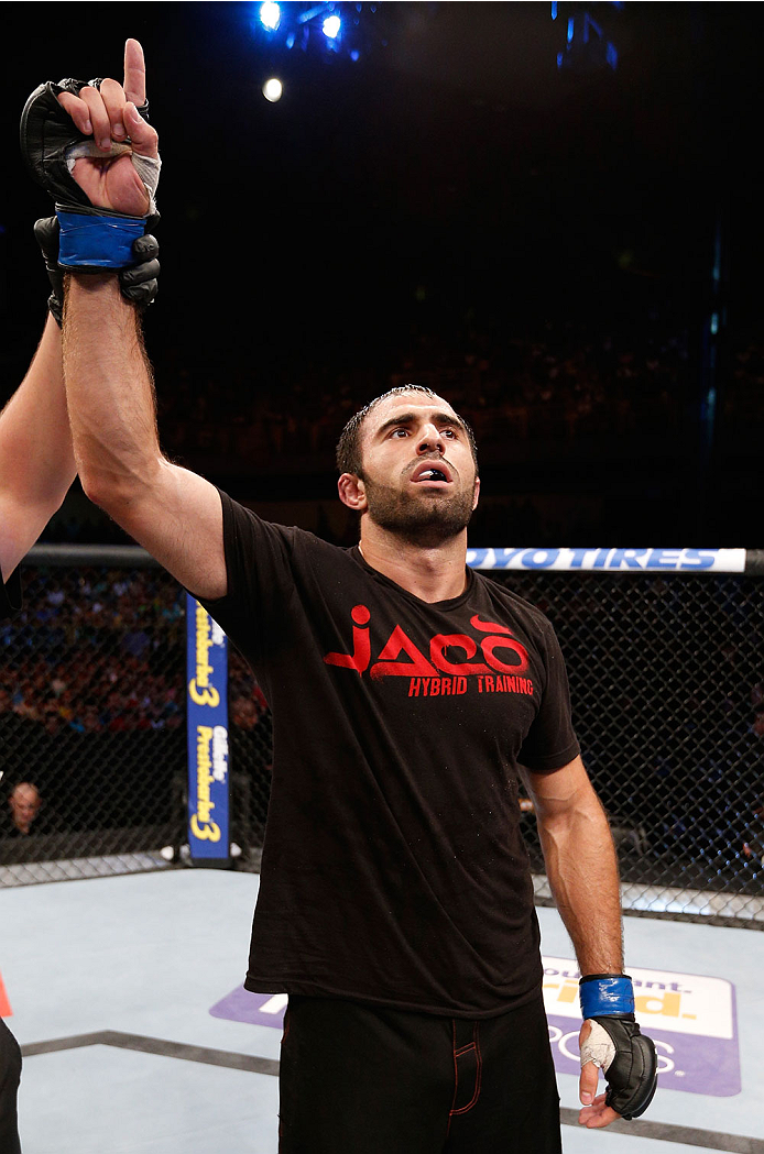 GOIANIA, BRAZIL - NOVEMBER 09: Omari Akhmedov reacts after his knockout victory over Thiago Perpetuo in their middleweight bout during the UFC event at Arena Goiania on November 9, 2013 in Goiania, Brazil. (Photo by Josh Hedges/Zuffa LLC/Zuffa LLC via Get