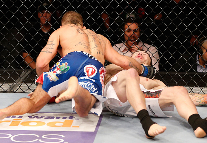 GOIANIA, BRAZIL - NOVEMBER 09: (L-R) Jeremy Stephens knocks out Rony ''Jason'' Mariano Bezerra with a punch in their featherweight bout during the UFC event at Arena Goiania on November 9, 2013 in Goiania, Brazil. (Photo by Josh Hedges/Zuffa LLC/Zuffa LLC