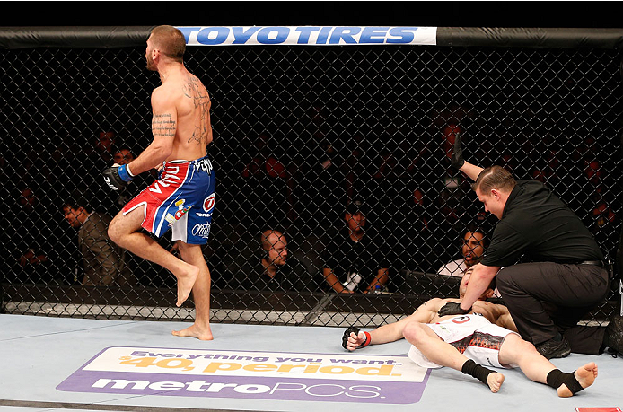 GOIANIA, BRAZIL - NOVEMBER 09: Jeremy Stephens (L) reacts after his knockout victory over Rony ''Jason'' Mariano Bezerra in their featherweight bout during the UFC event at Arena Goiania on November 9, 2013 in Goiania, Brazil. (Photo by Josh Hedges/Zuffa