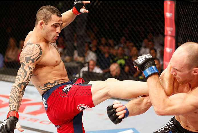 GOIANIA, BRAZIL - NOVEMBER 09: (L-R) Santiago Ponzinibbio kicks Ryan LaFlare in their welterweight bout during the UFC event at Arena Goiania on November 9, 2013 in Goiania, Brazil. (Photo by Josh Hedges/Zuffa LLC/Zuffa LLC via Getty Images)