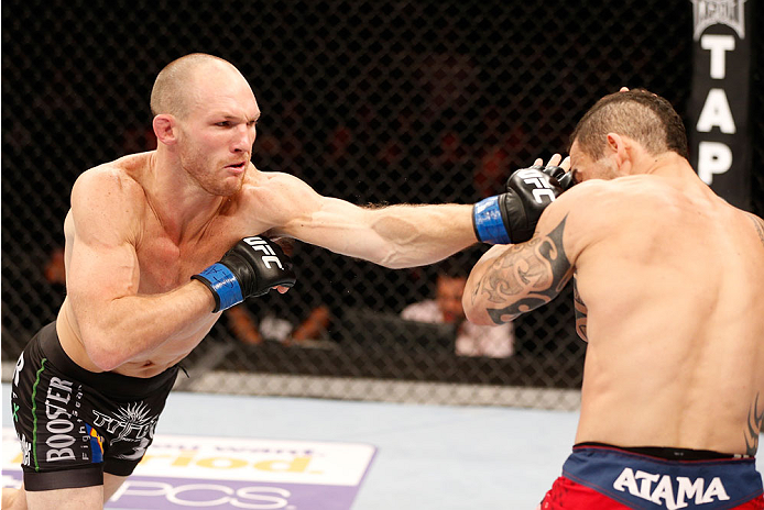 GOIANIA, BRAZIL - NOVEMBER 09: (L-R) Ryan LaFlare punches Santiago Ponzinibbio in their welterweight bout during the UFC event at Arena Goiania on November 9, 2013 in Goiania, Brazil. (Photo by Josh Hedges/Zuffa LLC/Zuffa LLC via Getty Images)