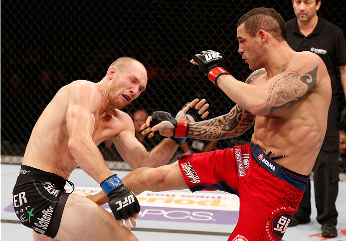 GOIANIA, BRAZIL - NOVEMBER 09: (R-L) Santiago Ponzinibbio kicks Ryan LaFlare in their welterweight bout during the UFC event at Arena Goiania on November 9, 2013 in Goiania, Brazil. (Photo by Josh Hedges/Zuffa LLC/Zuffa LLC via Getty Images)