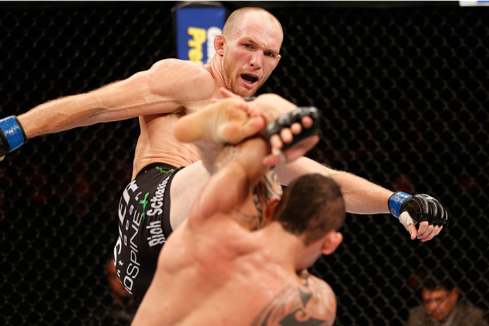 GOIANIA, BRAZIL - NOVEMBER 09: (L-R) Ryan LaFlare kicks Santiago Ponzinibbio in their welterweight bout during the UFC event at Arena Goiania on November 9, 2013 in Goiania, Brazil. (Photo by Josh Hedges/Zuffa LLC/Zuffa LLC via Getty Images)