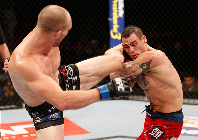 GOIANIA, BRAZIL - NOVEMBER 09: (L-R) Ryan LaFlare kicks Santiago Ponzinibbio in their welterweight bout during the UFC event at Arena Goiania on November 9, 2013 in Goiania, Brazil. (Photo by Josh Hedges/Zuffa LLC/Zuffa LLC via Getty Images)