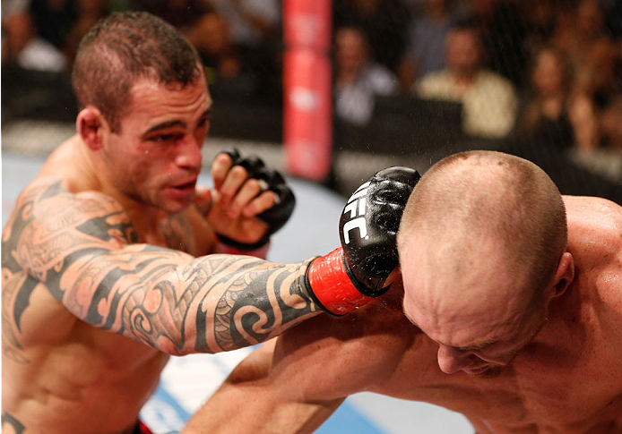 GOIANIA, BRAZIL - NOVEMBER 09: (L-R) Santiago Ponzinibbio punches Ryan LaFlare in their welterweight bout during the UFC event at Arena Goiania on November 9, 2013 in Goiania, Brazil. (Photo by Josh Hedges/Zuffa LLC/Zuffa LLC via Getty Images)
