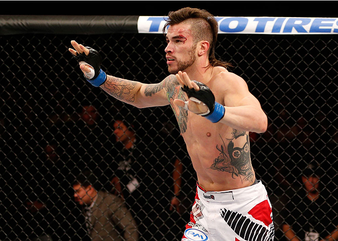 GOIANIA, BRAZIL - NOVEMBER 09: Brandon Thatch reacts after defeating Paulo Thiago in their welterweight bout during the UFC event at Arena Goiania on November 9, 2013 in Goiania, Brazil. (Photo by Josh Hedges/Zuffa LLC/Zuffa LLC via Getty Images)