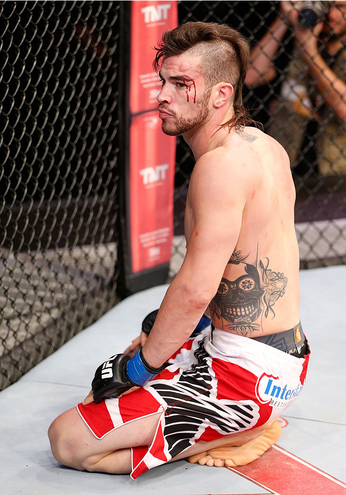 GOIANIA, BRAZIL - NOVEMBER 09: Brandon Thatch reacts after defeating Paulo Thiago in their welterweight bout during the UFC event at Arena Goiania on November 9, 2013 in Goiania, Brazil. (Photo by Josh Hedges/Zuffa LLC/Zuffa LLC via Getty Images)
