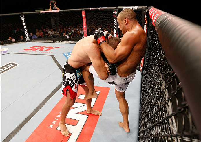 GOIANIA, BRAZIL - NOVEMBER 09: (R-L) Rafael ''Fejao'' Cavalcante knees Igor Pokrajac in their light heavyweight bout during the UFC event at Arena Goiania on November 9, 2013 in Goiania, Brazil. (Photo by Josh Hedges/Zuffa LLC/Zuffa LLC via Getty Images)