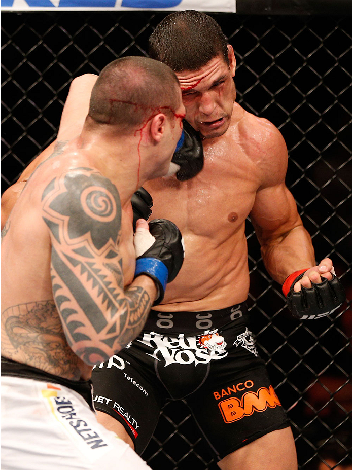 GOIANIA, BRAZIL - NOVEMBER 09: (L-R) Daniel Sarafian punches Cezar ''Mutante'' Ferreira in their middleweight bout during the UFC event at Arena Goiania on November 9, 2013 in Goiania, Brazil. (Photo by Josh Hedges/Zuffa LLC/Zuffa LLC via Getty Images)