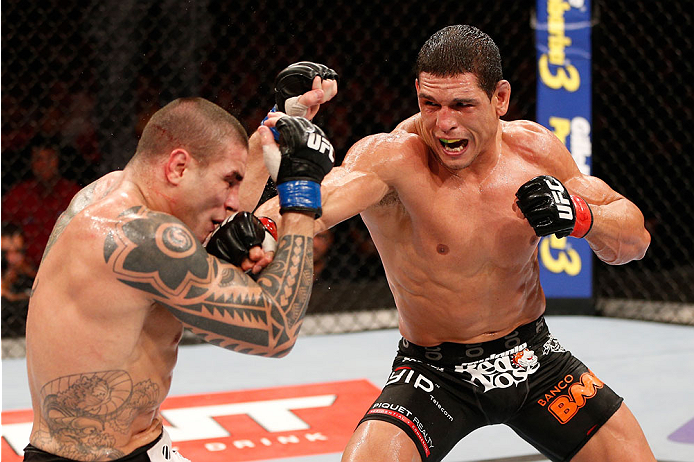 GOIANIA, BRAZIL - NOVEMBER 09: (R-L) Cezar ''Mutante'' Ferreira punches Daniel Sarafian in their middleweight bout during the UFC event at Arena Goiania on November 9, 2013 in Goiania, Brazil. (Photo by Josh Hedges/Zuffa LLC/Zuffa LLC via Getty Images)