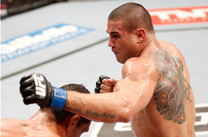 GOIANIA, BRAZIL - NOVEMBER 09: (R-L) Daniel Sarafian punches Cezar ''Mutante'' Ferreira in their middleweight bout during the UFC event at Arena Goiania on November 9, 2013 in Goiania, Brazil. (Photo by Josh Hedges/Zuffa LLC/Zuffa LLC via Getty Images)