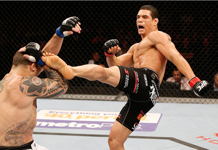 GOIANIA, BRAZIL - NOVEMBER 09: (R-L) Cezar "Mutante" Ferreira kicks Daniel Sarafian in their middleweight bout during the UFC event at Arena Goiania on November 9, 2013 in Goiania, Brazil. (Photo by Josh Hedges/Zuffa LLC/Zuffa LLC via Getty Images)