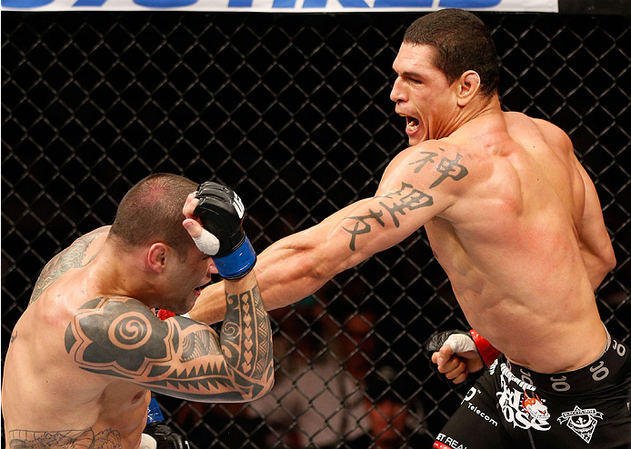 GOIANIA, BRAZIL - NOVEMBER 09: (R-L) Cezar "Mutante" Ferreira punches Daniel Sarafian in their middleweight bout during the UFC event at Arena Goiania on November 9, 2013 in Goiania, Brazil. (Photo by Josh Hedges/Zuffa LLC/Zuffa LLC via Getty Images)