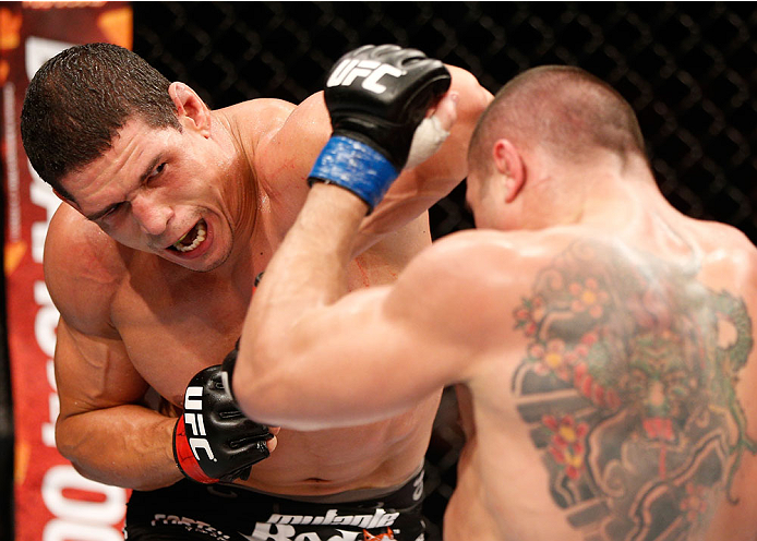 GOIANIA, BRAZIL - NOVEMBER 09: (L-R) Cezar "Mutante" Ferreira elbows Daniel Sarafian in their middleweight bout during the UFC event at Arena Goiania on November 9, 2013 in Goiania, Brazil. (Photo by Josh Hedges/Zuffa LLC/Zuffa LLC via Getty Images)