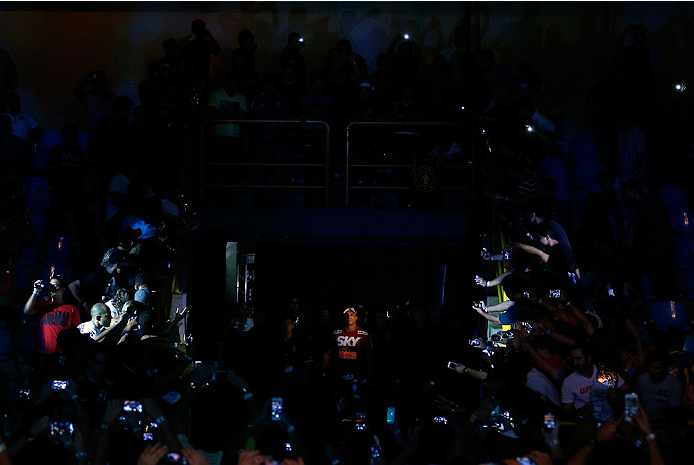 GOIANIA, BRAZIL - NOVEMBER 09: Vitor Belfort enters the arena before his light heavyweight bout against Dan Henderson during the UFC event at Arena Goiania on November 9, 2013 in Goiania, Brazil. (Photo by Josh Hedges/Zuffa LLC/Zuffa LLC via Getty Images)
