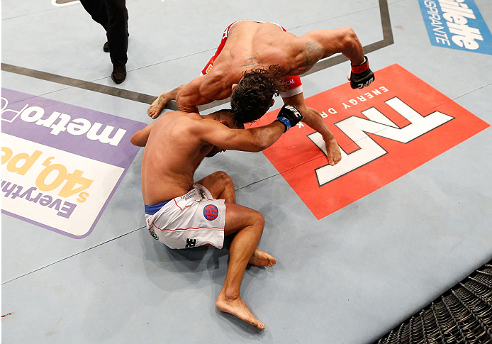 GOIANIA, BRAZIL - NOVEMBER 09: (R-L) Vitor Belfort punches Dan Henderson in their light heavyweight bout during the UFC event at Arena Goiania on November 9, 2013 in Goiania, Brazil. (Photo by Josh Hedges/Zuffa LLC/Zuffa LLC via Getty Images)