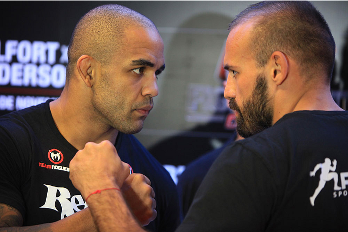 GOIANIA, BRAZIL - NOVEMBER 7: (L-R) Opponents Rafael 'Feijao"Cavalcante and Igor Pokrajac face off during UFC Fight Night open workout at Buena Vista Shopping on November 7, 2013 in Goiania, Brazil. (Photo by Weimer Carvalho/Zuffa LLC/Zuffa LLC via Getty