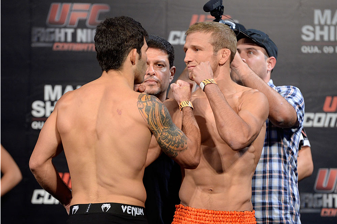 BARUERI, BRAZIL - OCTOBER 8: (L-R) Rafael Assuncao and TJ Dillashaw face off during the UFC Fight Night: Maia v Shields weigh-in at the Ginasio Jose Correa on October 8, 2013 in Barueri, Sao Paulo, Brazil. (Photo by Jeff Bottari/Zuffa LLC/Zuffa LLC via G