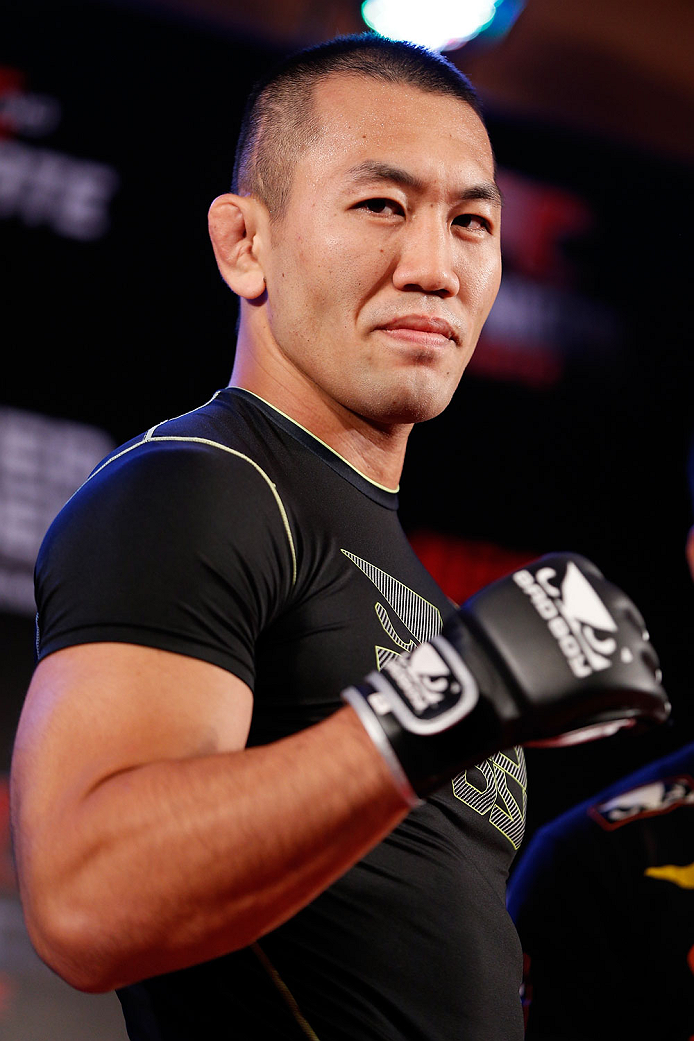 BELO HORIZONTE, BRAZIL - SEPTEMBER 02: Yushin Okami poses for a photo after an open training session for media at the Ouro Minas Palace Hotel on September 2, 2013 in Belo Horizonte, Brazil. (Photo by Josh Hedges/Zuffa LLC/Zuffa LLC via Getty Images)