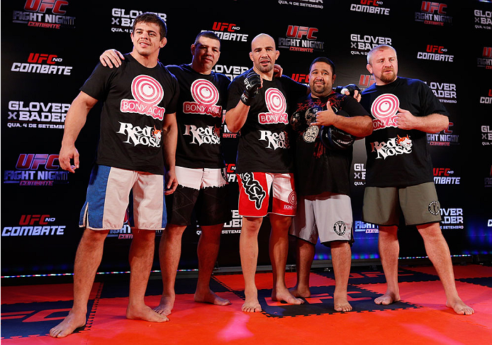 BELO HORIZONTE, BRAZIL - SEPTEMBER 02: Glover Teixeira (center) poses for a photo with his team after an open training session for media at the Ouro Minas Palace Hotel on September 2, 2013 in Belo Horizonte, Brazil. (Photo by Josh Hedges/Zuffa LLC/Zuffa