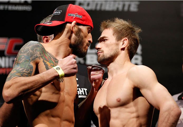 BELO HORIZONTE, BRAZIL - SEPTEMBER 03: (L-R) Opponents Marcos Vinicius and Ali Bagautinov face off during the UFC weigh-in event at Mineirinho Arena on September 3, 2013 in Belo Horizonte, Brazil. (Photo by Josh Hedges/Zuffa LLC/Zuffa LLC via Getty Image