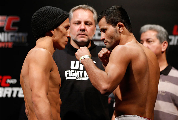 BELO HORIZONTE, BRAZIL - SEPTEMBER 03: (L-R) Opponents Joseph Benavidez and Jussier Formiga face off during the UFC weigh-in event at Mineirinho Arena on September 3, 2013 in Belo Horizonte, Brazil. (Photo by Josh Hedges/Zuffa LLC/Zuffa LLC via Getty Ima