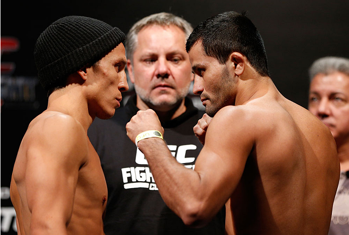 BELO HORIZONTE, BRAZIL - SEPTEMBER 03: (L-R) Opponents Joseph Benavidez and Jussier Formiga face off during the UFC weigh-in event at Mineirinho Arena on September 3, 2013 in Belo Horizonte, Brazil. (Photo by Josh Hedges/Zuffa LLC/Zuffa LLC via Getty Ima