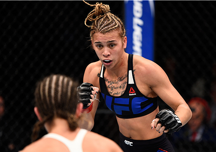 LAS VEGAS, NEVADA - DECEMBER 10: (R) Kailan Curran squares off with Emily Kagan in their women's strawweight bout during the UFC Fight Night event at The Chelsea at the Cosmopolitan of Las Vegas on December 10, 2015 in Las Vegas, Nevada. (Photo by Jeff