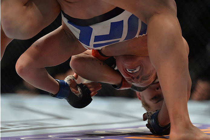 LAS VEGAS, NEVADA - DECEMBER 10: (Top) Kailan Curran submits Emily Kagan in their women's strawweight bout during the UFC Fight Night event at The Chelsea at the Cosmopolitan of Las Vegas on December 10, 2015 in Las Vegas, Nevada. (Photo by Brandon Magn