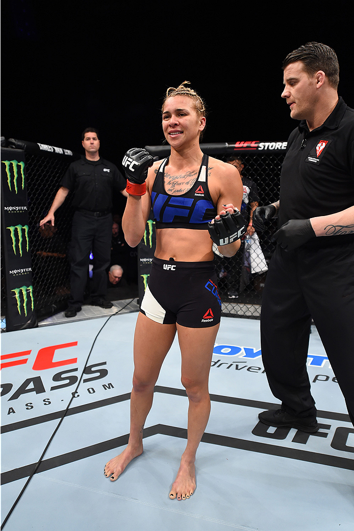 LAS VEGAS, NEVADA - DECEMBER 10: Kailan Curran celebrates her win over Emily Kagan in their women's strawweight bout during the UFC Fight Night event at The Chelsea at the Cosmopolitan of Las Vegas on December 10, 2015 in Las Vegas, Nevada. (Photo by Je
