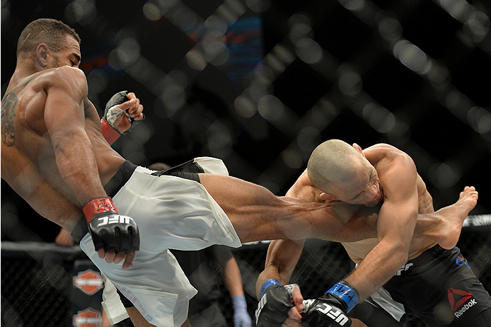 LAS VEGAS, NEVADA - DECEMBER 10: (L) Danny Roberts kicks Nathan Coy in their welterweight bout during the UFC Fight Night event at The Chelsea at the Cosmopolitan of Las Vegas on December 10, 2015 in Las Vegas, Nevada. (Photo by Jeff Bottari/Zuffa LLC/Z