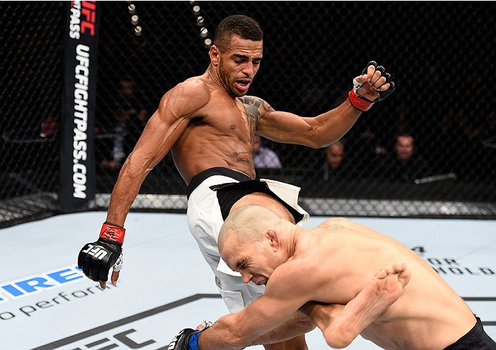 LAS VEGAS, NEVADA - DECEMBER 10: (L) Danny Roberts kicks Nathan Coy in their welterweight bout during the UFC Fight Night event at The Chelsea at the Cosmopolitan of Las Vegas on December 10, 2015 in Las Vegas, Nevada. (Photo by Jeff Bottari/Zuffa LLC/Z