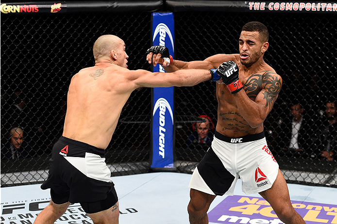 LAS VEGAS, NEVADA - DECEMBER 10: (L) Nathan Coy and Danny Roberts exchange punches in their welterweight bout during the UFC Fight Night event at The Chelsea at the Cosmopolitan of Las Vegas on December 10, 2015 in Las Vegas, Nevada. (Photo by Jeff Bott