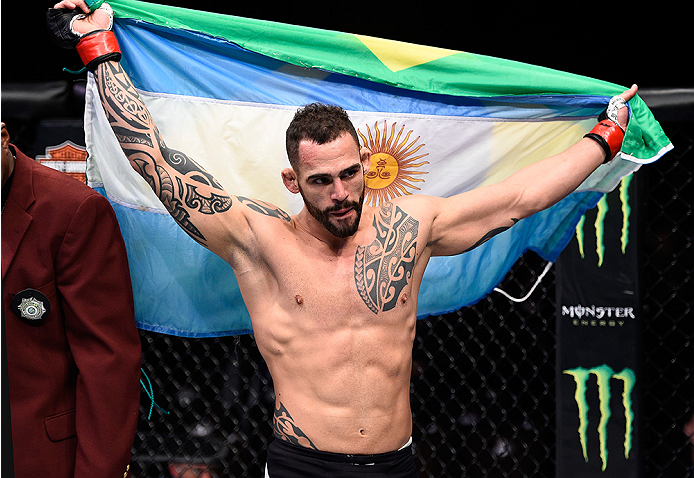LAS VEGAS, NEVADA - DECEMBER 10: Santiago Ponzinibbio celebrates his win over Andreas Stahl in their welterweight bout during the UFC Fight Night event at The Chelsea at the Cosmopolitan of Las Vegas on December 10, 2015 in Las Vegas, Nevada. (Photo by