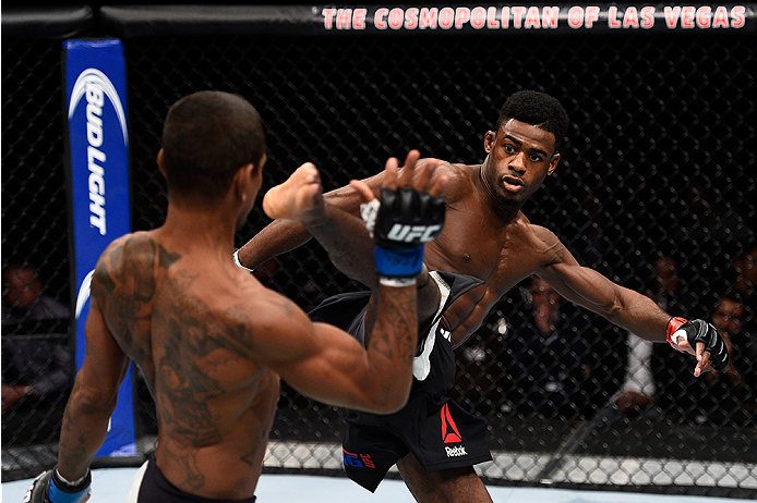 LAS VEGAS, NEVADA - DECEMBER 10: (R) Aljamain Sterling kicks Johnny Eduardo in their bantamweight bout during the UFC Fight Night event at The Chelsea at the Cosmopolitan of Las Vegas on December 10, 2015 in Las Vegas, Nevada. (Photo by Jeff Bottari/Zuf