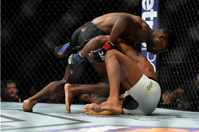 LAS VEGAS, NEVADA - DECEMBER 10: (Top) Aljamain Sterling grapples with Johnny Eduardo in their bantamweight bout during the UFC Fight Night event at The Chelsea at the Cosmopolitan of Las Vegas on December 10, 2015 in Las Vegas, Nevada. (Photo by Brando