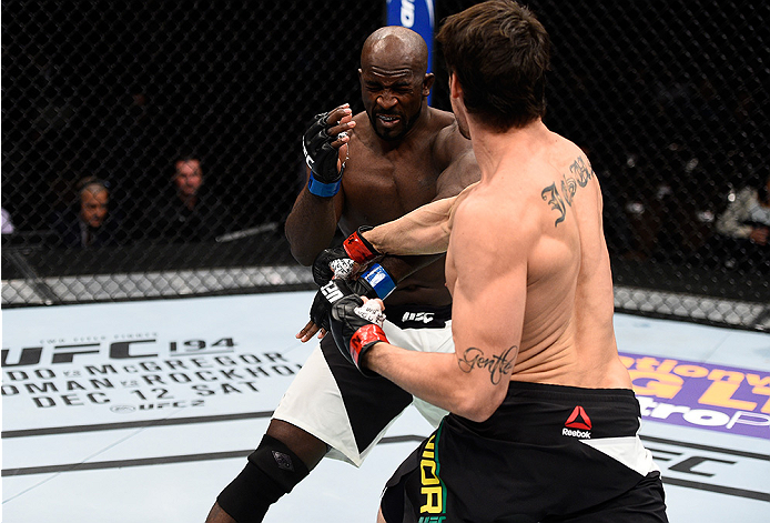 LAS VEGAS, NEVADA - DECEMBER 10: (R) Antonio Carlos Junior punches Kevin Casey in their middleweight bout during the UFC Fight Night event at The Chelsea at the Cosmopolitan of Las Vegas on December 10, 2015 in Las Vegas, Nevada. (Photo by Jeff Bottari/