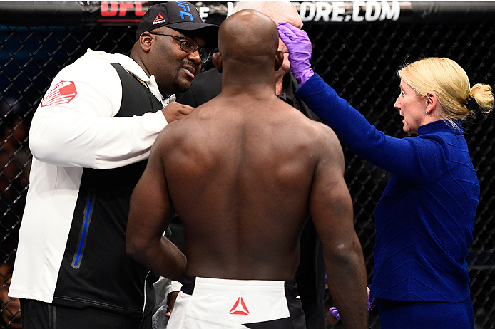 LAS VEGAS, NEVADA - DECEMBER 10: Doctor checks Kevin Casey after accidental eye poke in his middleweight bout against Antonio Carlos Junior during the UFC Fight Night event at The Chelsea at the Cosmopolitan of Las Vegas on December 10, 2015 in Las Vegas