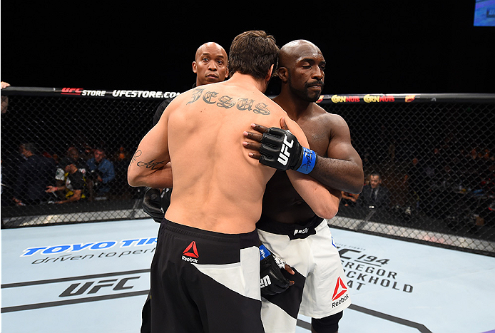 LAS VEGAS, NEVADA - DECEMBER 10: (L) Antonio Carlos Junior and Kevin Casey react to the no contest decision after an accidental eye poke in their middleweight bout during the UFC Fight Night event at The Chelsea at the Cosmopolitan of Las Vegas on Decemb