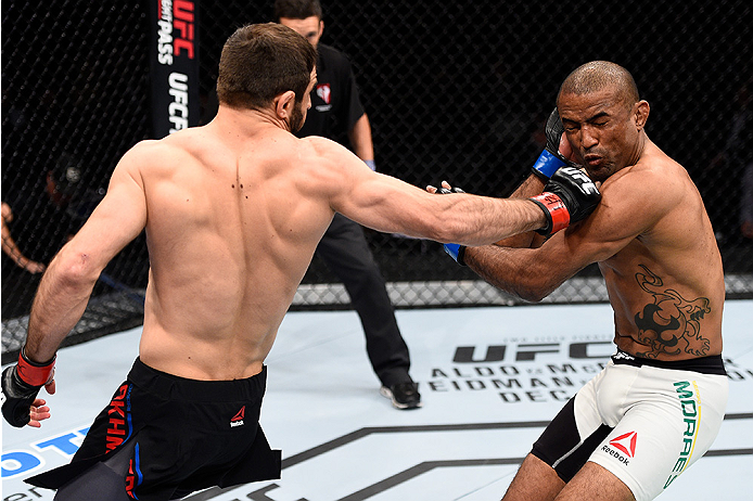 LAS VEGAS, NEVADA - DECEMBER 10: (L) Omari Akhmedov punches Sergio Moraes in their welterweight bout during the UFC Fight Night event at The Chelsea at the Cosmopolitan of Las Vegas on December 10, 2015 in Las Vegas, Nevada. (Photo by Jeff Bottari/Zuffa
