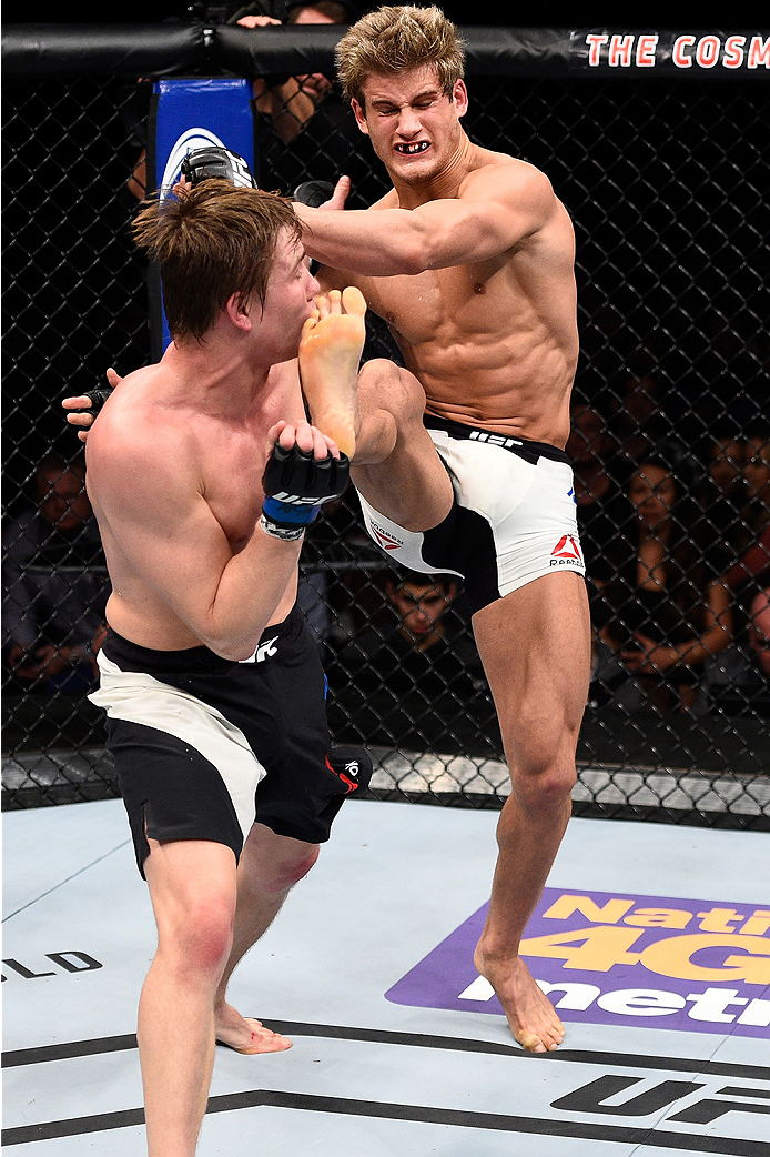 LAS VEGAS, NEVADA - DECEMBER 10: (R) Sage Northcutt kicks Cody Pfister in their lightweight bout during the UFC Fight Night event at The Chelsea at the Cosmopolitan of Las Vegas on December 10, 2015 in Las Vegas, Nevada. (Photo by Jeff Bottari/Zuffa LLC