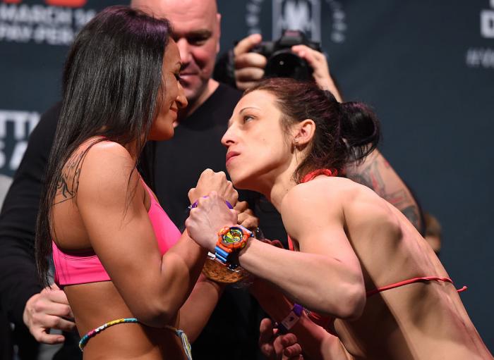 Even as an amateur, Joanna Jedrzejczyk's staredowns were already her trademark. This one is notable because it is the one that began her reign as UFC strawweight champion. She would finish Carla Esparza at UFC 185 with a 2nd round KO. (Photo by Josh Hedge