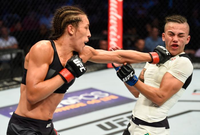 DALLAS, TX - MAY 13: (L-R) Joanna Jedrzejczyk punches Jessica Andrade in their UFC women's strawweight championship fight during the UFC 211 event at the American Airlines Center on May 13, 2017 in Dallas, Texas. (Photo by Josh Hedges/Zuffa LLC/Zuffa LLC