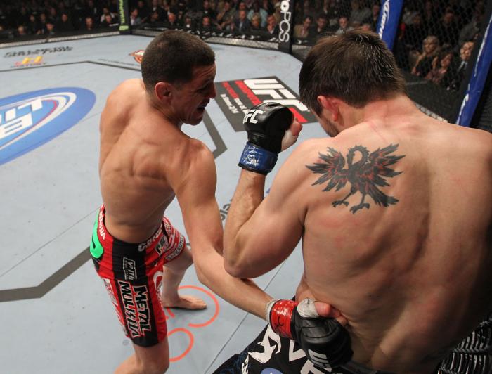 LAS VEGAS - FEBRUARY 04: Nick Diaz (left) punches Carlos Condit during the UFC 143 event at Mandalay Bay Events Center on February 4, 2012 in Las Vegas, Nevada. (Photo by Nick Laham/Zuffa LLC/Zuffa LLC via Getty Images) *** Local Caption *** Nick Diaz;